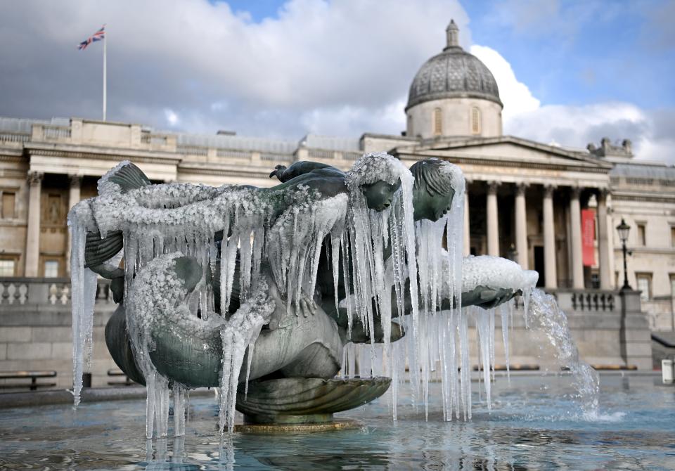 Ice melts in the sunshine after forming on Trafalgar Square’s fountainsEPA