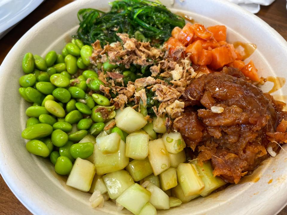 One option at Sweet Retreat in Alcoa is a poke bowl with brown rice, chicken and shrimp, cucumber, edamame, green onion, red onion, soy sauce and fried onion.