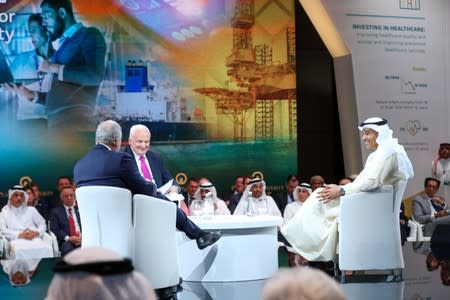 Emirati businessman Mohamed Alabbar, chairman of Dubai-based Emaar Properties, (R) is seen at the "Peace to Prosperity" conference in Manama