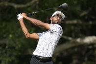 Akshay Bhatia watches his tee shot on the 14th hole during the third round of the Texas Open golf tournament, Saturday, April 6, 2024, in San Antonio. (AP Photo/Eric Gay)