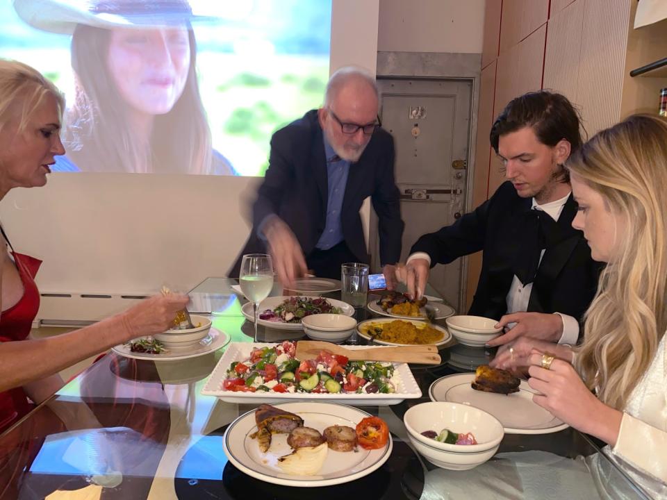 Nicholas Braun takes a photo of his family gathering to eat during the Emmys.