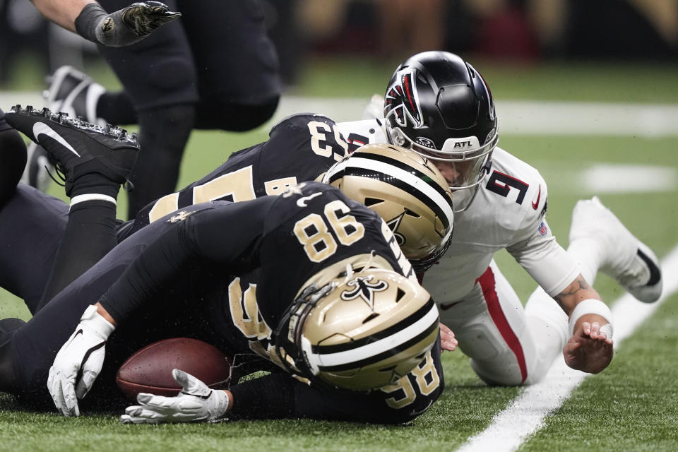 New Orleans Saints defensive end Payton Turner (98) recovers a fumble near the end zone in the second half of an NFL football game against the in New Orleans, Sunday, Jan. 7, 2024. (AP Photo/Gerald Herbert)