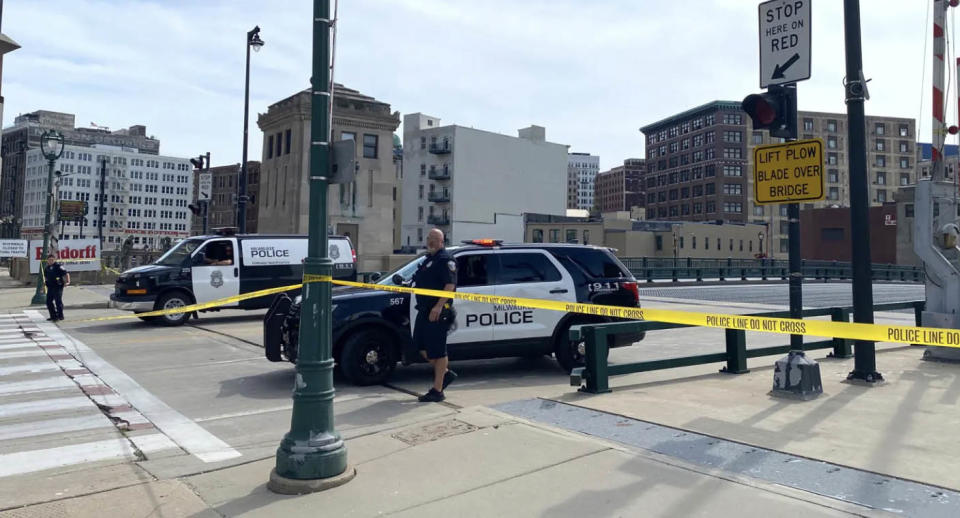 Police cars and officers on the road 