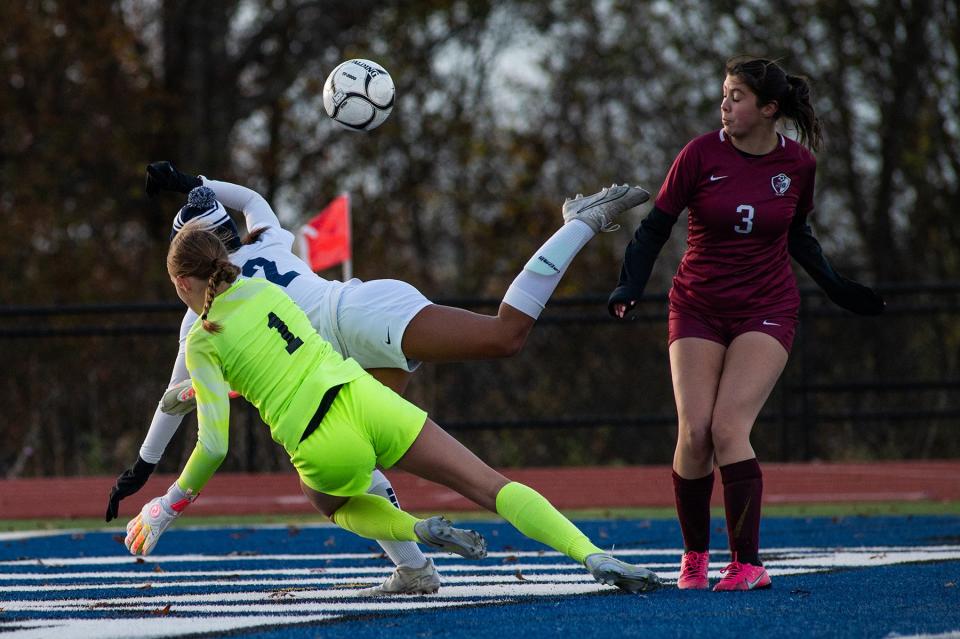 O'Neill keeper CJ Conkey, left, and Briarcliff's Ella Auguste collide in front of the O'Neill goal during the girls Class B subregional soccer game in Wallkill, NY on Wednesday, November 1, 2023. O'Neill defeated Briarcliff in double overtime 3-2. KELLY MARSH/FOR THE TIMES HERALD-RECORD