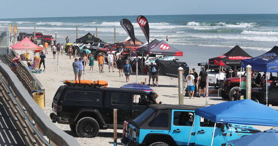 Jeep enthusiasts gather on the beach behind Hard Rock Hotel for the Jeep Beach "Jeeps At the Rock" event on Wednesday in Daytona Beach. The 10-day Jeep Beach event concludes with an early morning Jeep parade on Sunday along the shores of Daytona Beach.