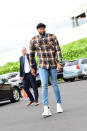<p>DeMarcus Cousins wears a Fear of God checkered shirt and white Gucci Flashtrek sneakers walking into the ORACLE Arena on April 2. </p>