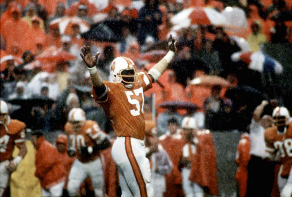 This Dec. 16, 1979, photo shows Tampa Bay Buccaneers linebacker David Lewis celebrating Tampa Bay's 3-0 win over the Kansas City Chiefs, in Tampa, Fla. Lewis, a key member of the Tampa Bay Buccaneers’ 1979 team that reached the NFC title game, has died. He was 65. Lewis died Tuesday, July 14, 2020, in Tampa. The cause was not immediately known, but he had struggled with health issues in recent years, according to Southern California, where he played in college. (Tampa Bay Times via AP)