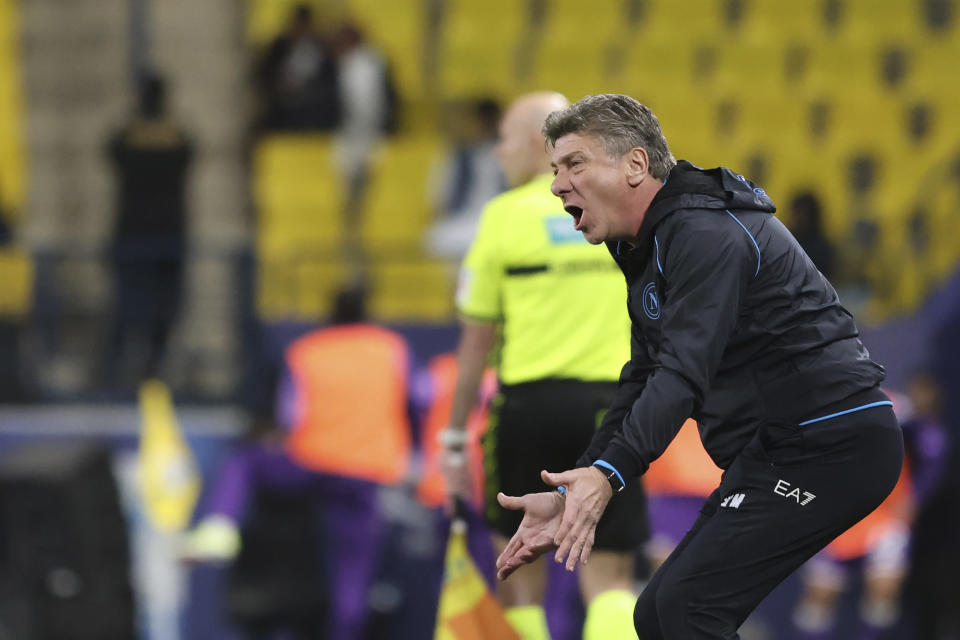 Napoli's head coach Walter Mazzarri shouts to his players during the Italian Super Cup Semi-final soccer match between Fiorentina and Napoli at Al Awwal Park Stadium in Riyadh, Saudi Arabia, Thursday, Jan. 18, 2024. (AP Photo)