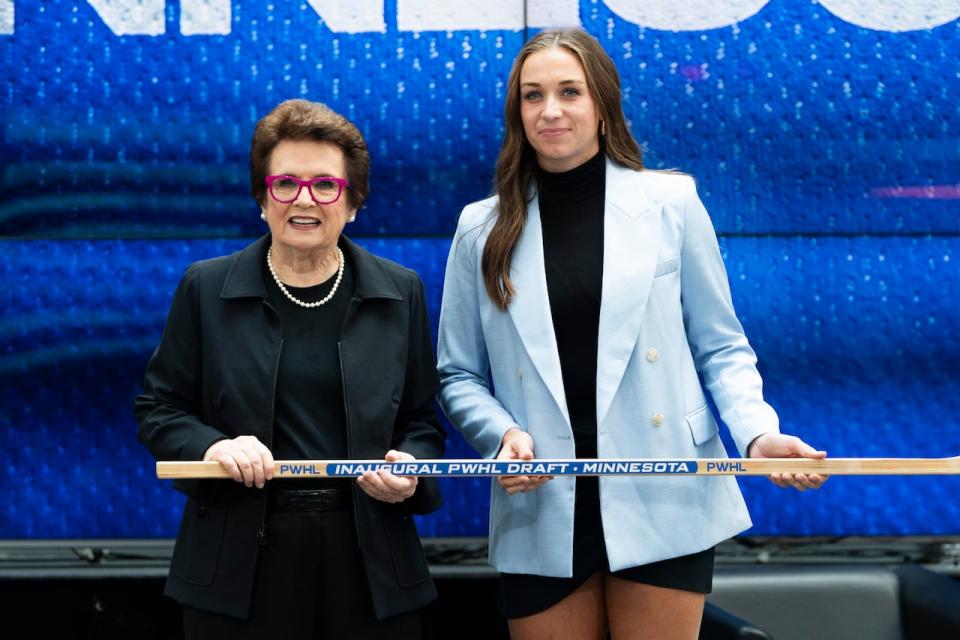 Taylor Heise, posing here with Billie Jean King, was the 1st overall pick by Minnesota in the 2023 PWHL draft. (Spencer Colby/The Canadian Press - image credit)