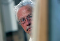 Austrian author Peter Handke attends a ceremony before receives the Order of the Karadjordje's Star from Serbian President Aleksandar Vucic in Belgrade, Serbia, Sunday, May 9, 2021. Serbia has decorated Austrian Nobel literature laureate Peter Handke, who is known for his apologist views over Serb war crimes during the 1990s' wars in the Balkans. (AP Photo/Darko Vojinovic)