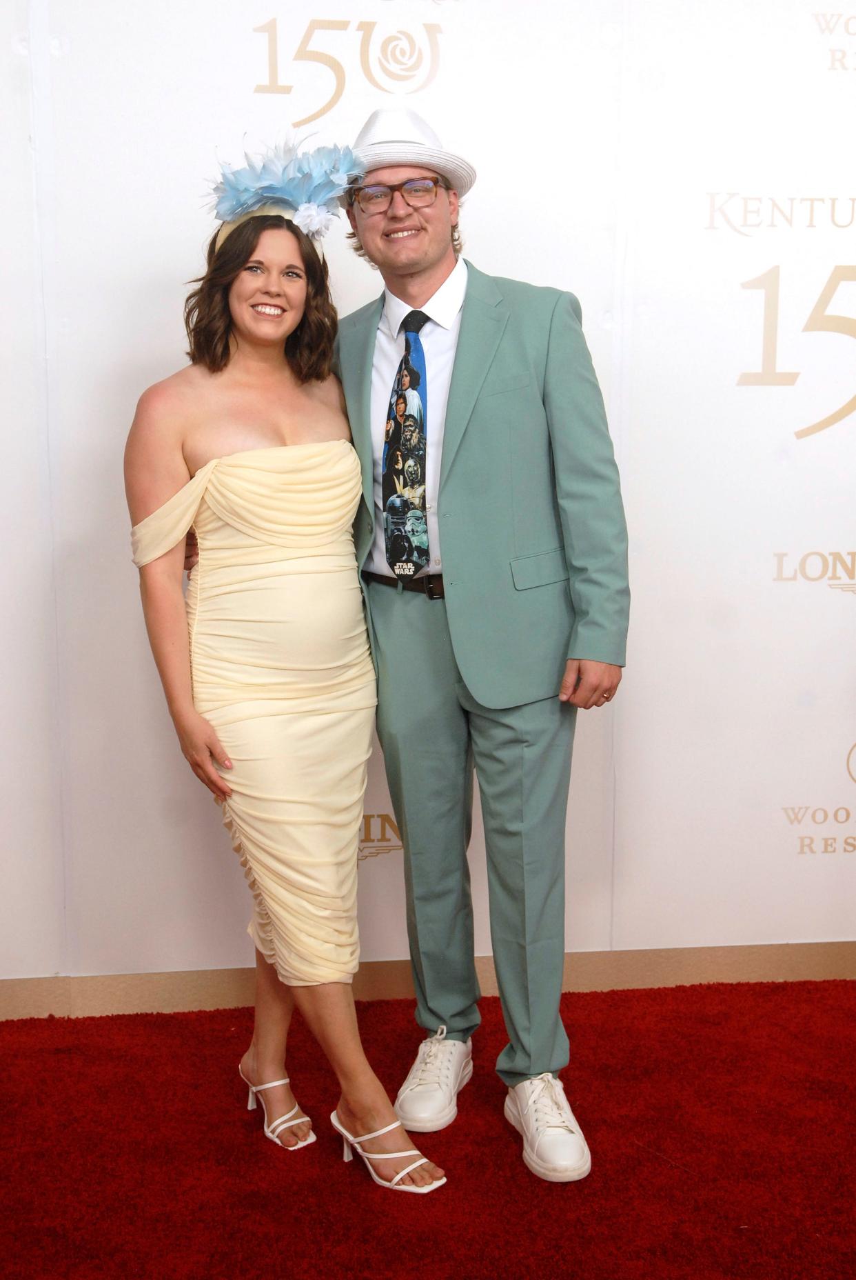 Comedian Joey Mulinaro, right, poses on the 150th Kentucky Derby red carpet Saturday. May 04, 2024