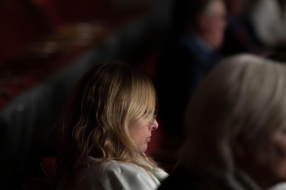 Dr. Heather Maune sits back in her chair while listening from the House gallery while HB 883 is discussed at the Tennessee state Capitol in Nashville, Tenn., Monday, March 20, 2023.