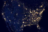 This image of the United States of America at night is a composite assembled from data acquired by the Suomi NPP satellite in April and October 2012. The image was made possible by the new satellite’s “day-night band” of the Visible Infrared Imaging Radiometer Suite (VIIRS), which detects light in a range of wavelengths from green to near-infrared and uses filtering techniques to observe dim signals such as city lights, gas flares, auroras, wildfires, and reflected moonlight. (NASA)