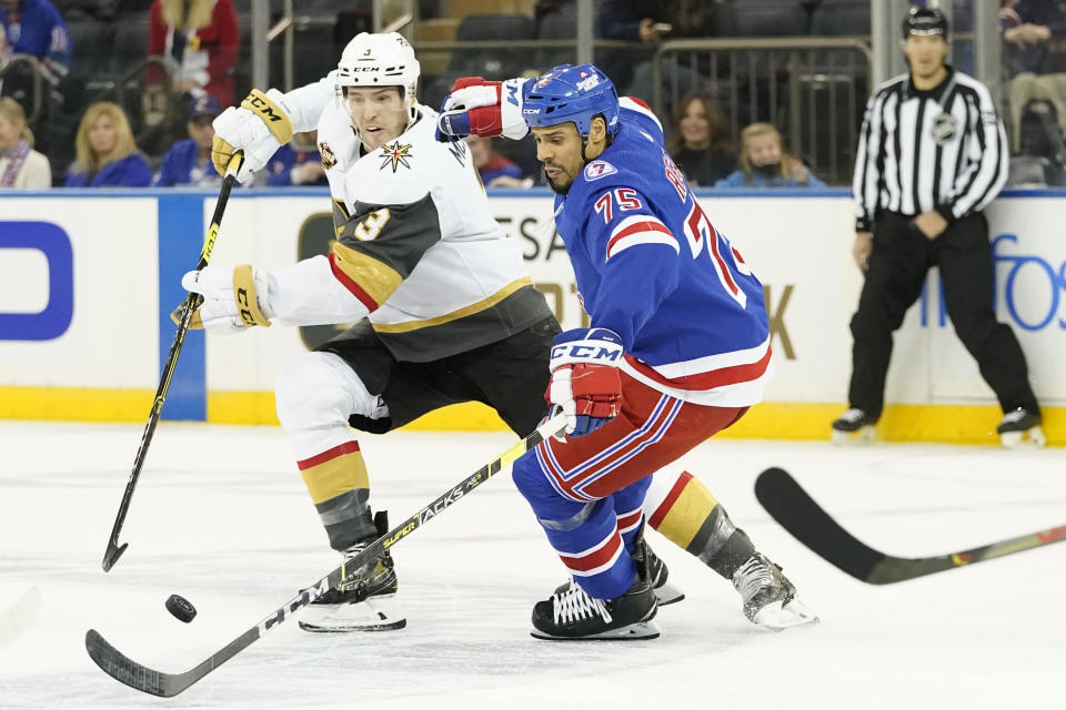 Vegas Golden Knights defenseman Brayden McNabb (3) skates against New York Rangers right wing Ryan Reaves (75) during the second period of an NHL hockey game, Friday, Dec. 17, 2021, at Madison Square Garden in New York. (AP Photo/Mary Altaffer)