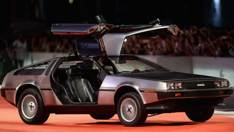 A photo of a DeLorean sports car on a red carpet. 