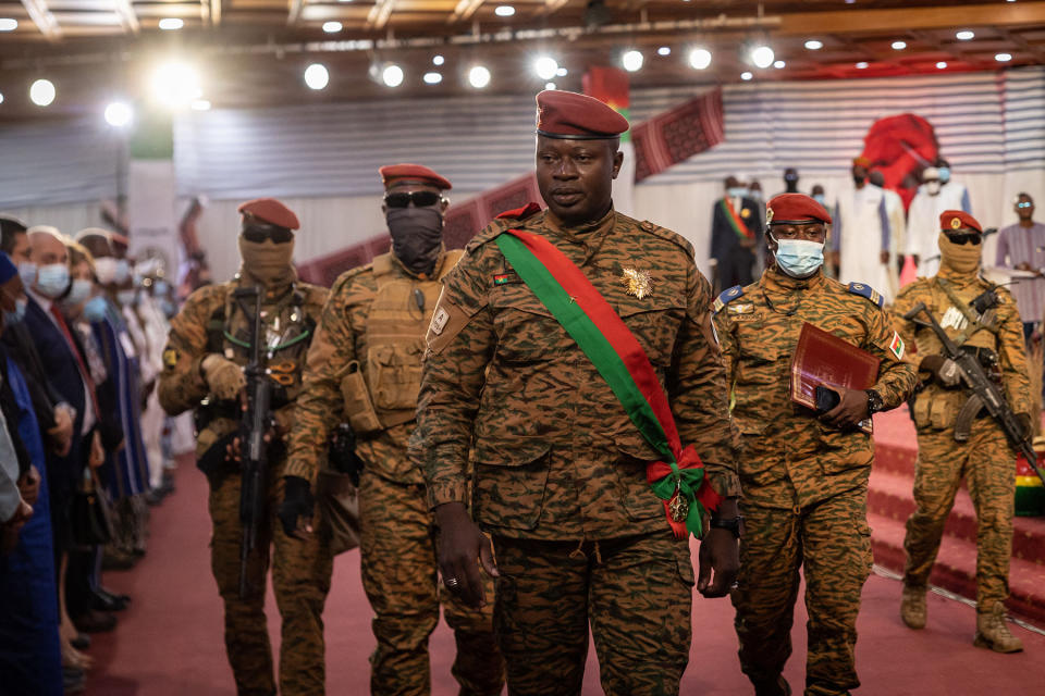 TOPSHOT - Lieutenant-Colonel Paul-Henri Sandaogo Damiba, President of Burkina Faso, arrives to his inauguration ceremony as President of Transition, in Ouagadougou, on March 2, 2022. - After being sworn in on February 16 before the Constitutional Council of Burkina Faso, Lieutenant-Colonel Paul-Henri Sandaogo Damiba, author of a coup d'etat on January 24, was again invested as president on Wednesday, the day after the adoption of a transition charter. (Photo by OLYMPIA DE MAISMONT / AFP) (Photo by OLYMPIA DE MAISMONT/AFP via Getty Images)