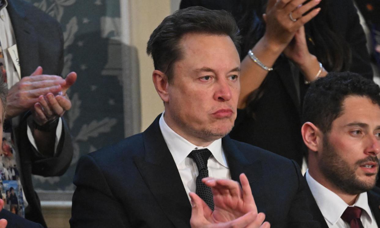 <span>Elon Musk applauds at Benjamin Netanyahu’s congressional visit at the US Capitol on 24 July 2024.</span><span>Photograph: Saul Loeb/AFP/Getty Images</span>