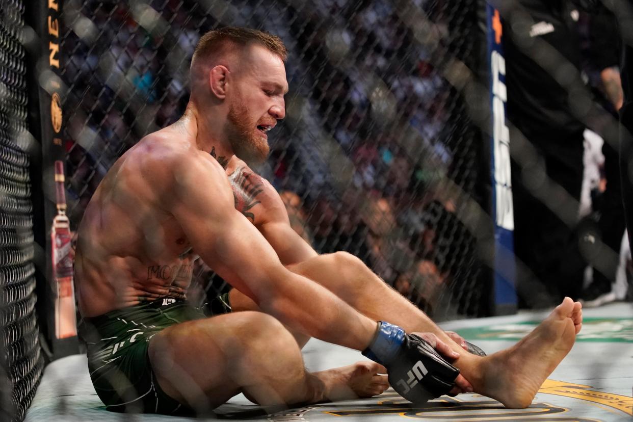 Conor McGregor suffered a horrible leg injury during his defeat by Dustin Poirier at UFC 264 (AP)