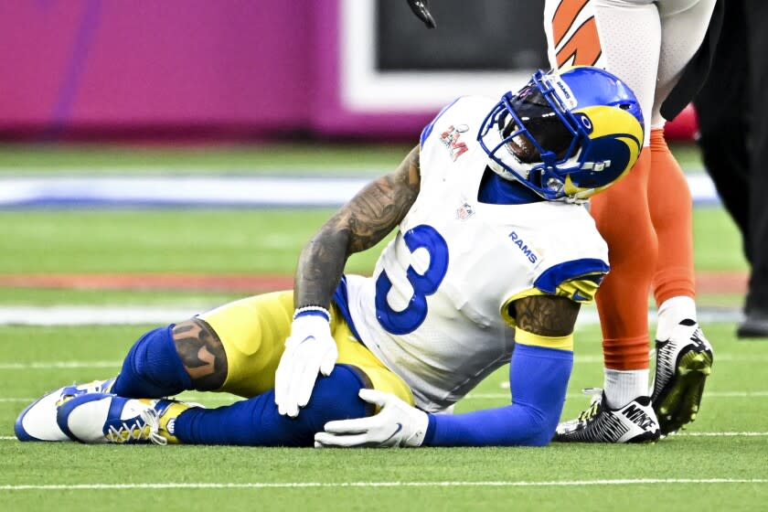 Inglewood, CA - February 13: Los Angeles Rams wide receiver Odell Beckham Jr. (3) grabs onto his knee.