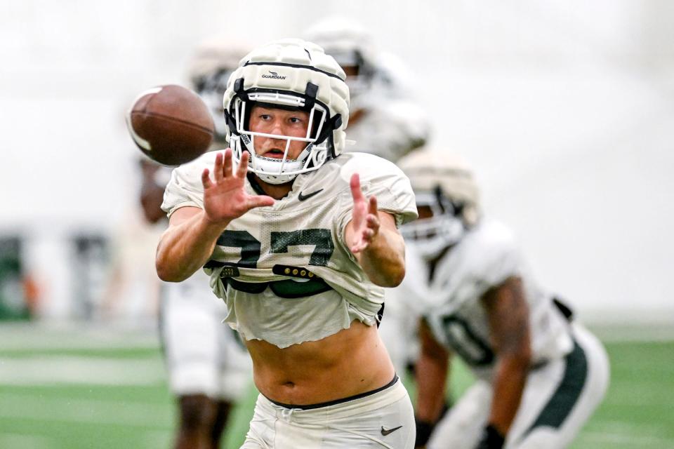 Michigan State's Cal Haladay catches a ball in a practice during camp on Monday, Aug. 5, 2024, at the indoor practice facility in East Lansing.