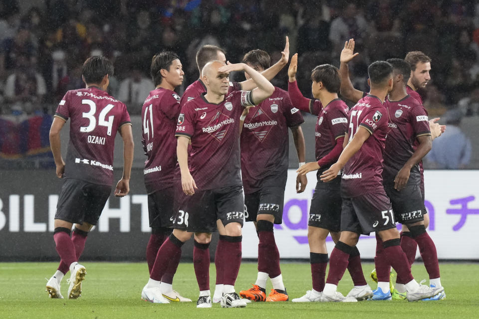 Vissel Kobe's Andres Iniesta looks on after celebrates during a friendly soccer match between his Japanese club Vissel Kobe and his old club Barcelona at the National Stadium in Tokyo, Tuesday, June 6, 2023. (AP Photo/Eugene Hoshiko)