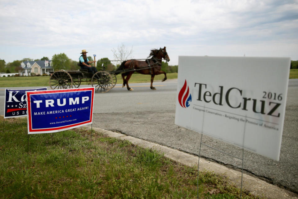 An Amish buggy travels past a Mechanicsville polling station