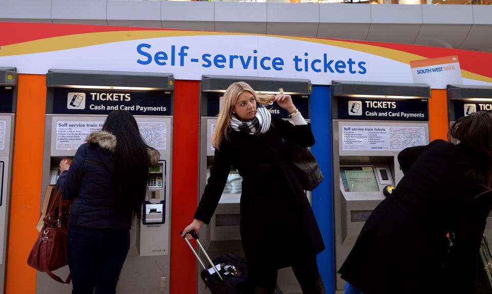 train tickets Train passengers buy their tickets at Waterloo Station in central London following the announcement that hard-pressed rail commuters will have to fork out for above-inflation rises in the cost of their season tickets in the new year.