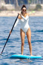<p>Kendall Jenner took a break from all the glam at the Cannes Film Festival to have a little fun in the sun. Of course, the reality star turned model would wear a stylish off-the-shoulder bathing suit to go paddleboarding! (Photo: BackGrid)<br><br></p>