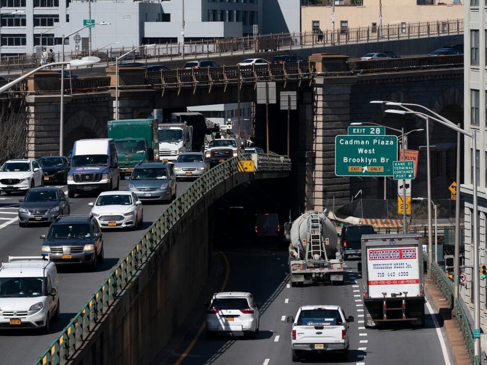 Vehicles drive along the Brooklyn Queens Expressway in 2021.