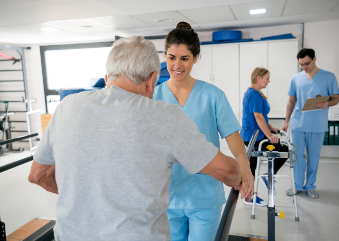 Occupational therapists helping patients.