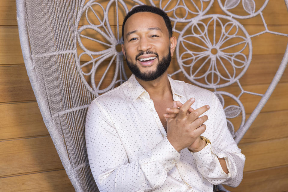 John Legend poses for a portrait on Monday, Aug. 15, 2022, in West Hollywood, Calif., to promote his latest double album "Legend." (Photo by Willy Sanjuan/Invision/AP)