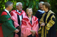 Former US Secretary of State Hillary Clinton laughs with University Chancellor and Former President of Ireland Mary Robinson before being recognised with an honorary degree of Doctor of Laws at Trinity College Dublin, Ireland June 22, 2018. REUTERS/Clodagh Kilcoyne