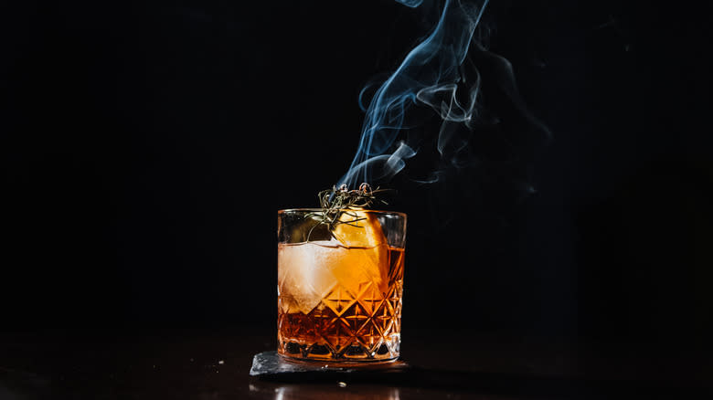 smoke rising from whiskey