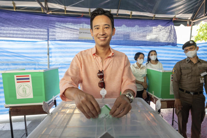 Leader of Move Forward Party Pita Limjaroenrat poses as he casts his vote during a general election at a polling station in Bangkok, Thailand, Sunday, May 14, 2023. Voters in Thailand were heading to the polls on Sunday in an election touted as a pivotal chance for change, eight years after incumbent Prime Minister Prayuth Chan-ocha first came to power in a 2014 coup. (AP Photo/Rapeephat Sitichailapa)