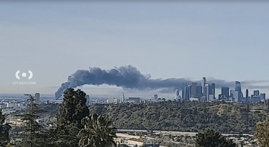 A large fire erupted at a building in L.A.’s Fashion District, sending plumes of smoke billowing into the air across downtown Los Angeles on Mar. 9, 2024. (Citizen App)