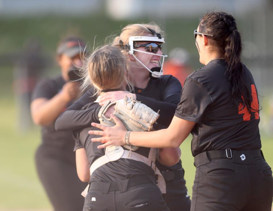 Hoover pitcher Summer McCaw celebrates with catcher Sienna Koosh after winning the Division I district final in Massillon, Wednesday, May 17, 2023.
