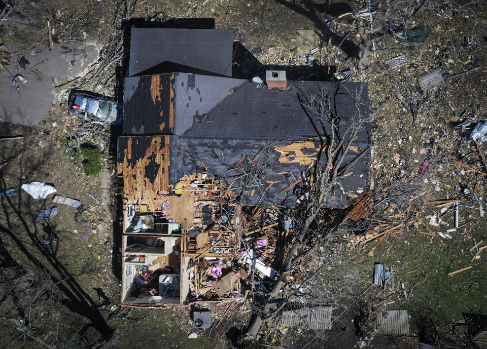 A house is destroyed from a tornado in Covington, Tenn., Saturday, April 1, 2023. Storms that spawned possibly dozens of tornadoes have killed several people in the South and Midwest. (Patrick Lantrip/Daily Memphian via AP)