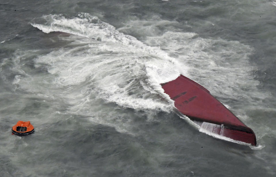 A South Korean tanker is seen capsized off Mutsure Island, Yamaguchi prefecture, southwestern Japan Wednesday, March 20, 2024. The coast guard said it received a distress call from the Keoyoung Sun chemical tanker, saying that it was tilting and was taking refuge near the Island. (Kyodo News via AP)