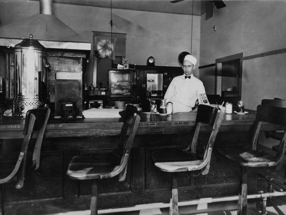 1930: Man Behind The Counter