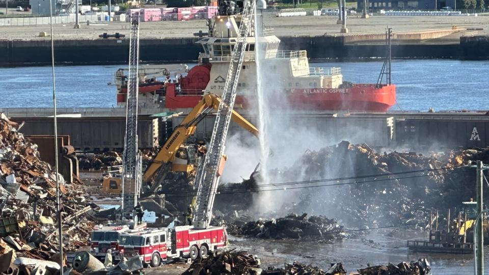 The American Iron and Metal scrap yard fire is under control, Saint John Fire Chief Kevin Clifford says.
