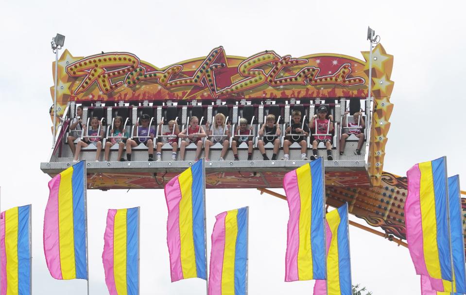 Granville's annual Fourth of July celebration includes carnival games, rides and more filling East Broadway.