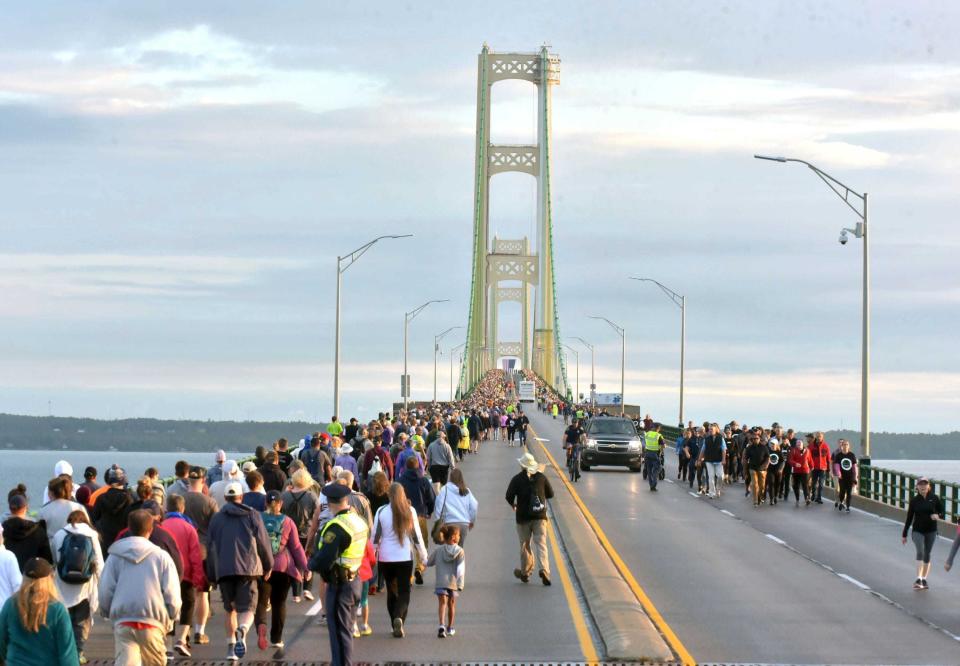 Pedestrians walk the Mackinac Bridge on Monday, Sept. 2, 2019, during the 62nd annual Labor Day Bridge Walk