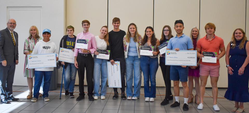 Pine View School's STRIVE Award winners with Principal Stephen Covert, Sarasota County School Board Chair Karen Rose, Education Foundation board member Jenni Infanti, and Education Foundation staffer Kayla Bailey.