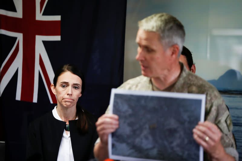 New Zealand's Prime Minister Jacinda Ardern looks on at a media standup in the aftermath of the eruption of White Island volcano, also known by its Maori name Whakaari, at Whakatane