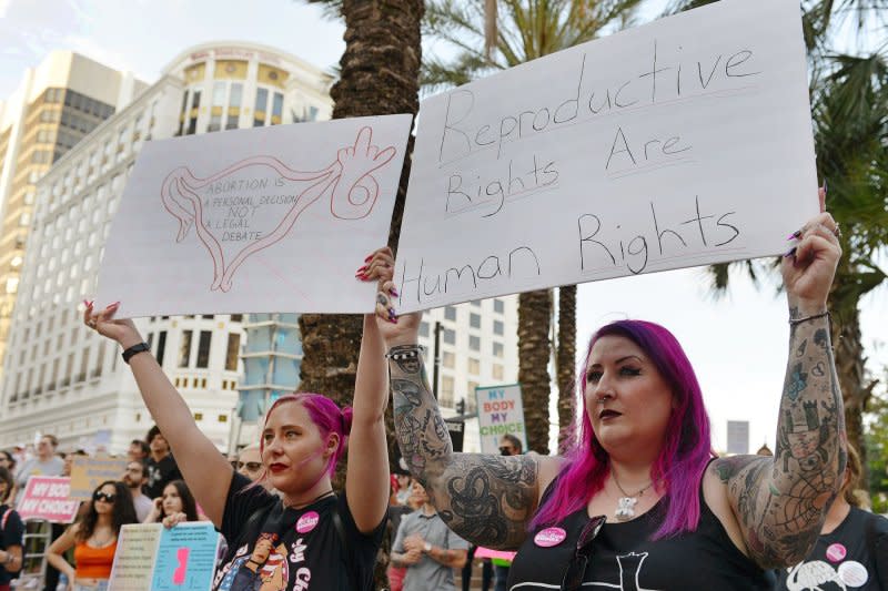 Abortion rights supporters rally at Orlando City Hall before heading out on a march through downtown in 2022. File Photo by Chris Chew/UPI