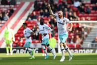 Britain Soccer Football - Sunderland v West Ham United - Premier League - Stadium of Light - 15/4/17 West Ham United's James Collins celebrates scoring their second goal with team mates Reuters / Scott Heppell Livepic