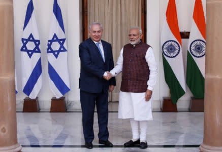Israeli Prime Minister Benjamin Netanyahu shakes hands with his Indian counterpart Narendra Modi during a photo opportunity ahead of their meeting at Hyderabad House in New Delhi, India, January 15, 2018. REUTERS/Adnan Abidi