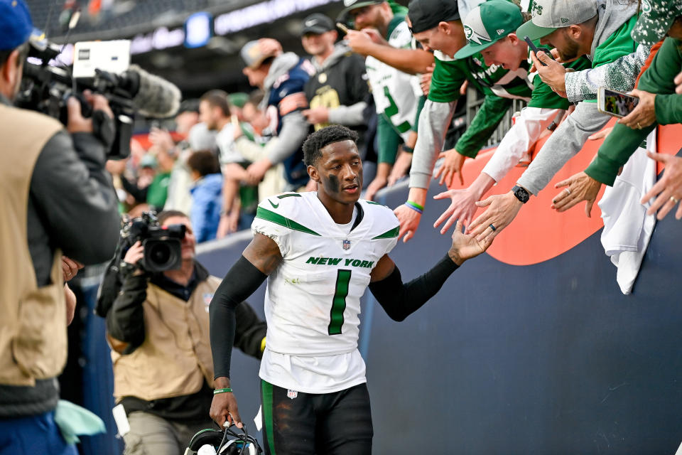 DENVER, COLORADO - OCTOBER 23: Cornerback Sauce Gardner #1 of the New York Jets celebrates with fans after a win over the Denver Broncos at Empower Field at Mile High on October 23, 2022 in Denver, Colorado. (Photo by Dustin Bradford/Getty Images)