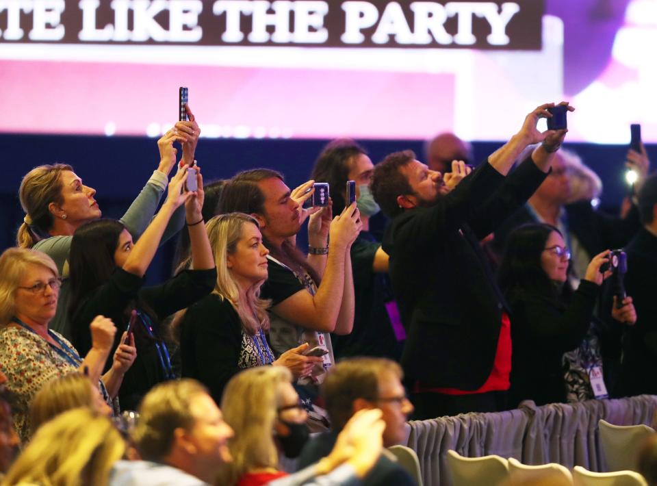 maskless people at CPAC