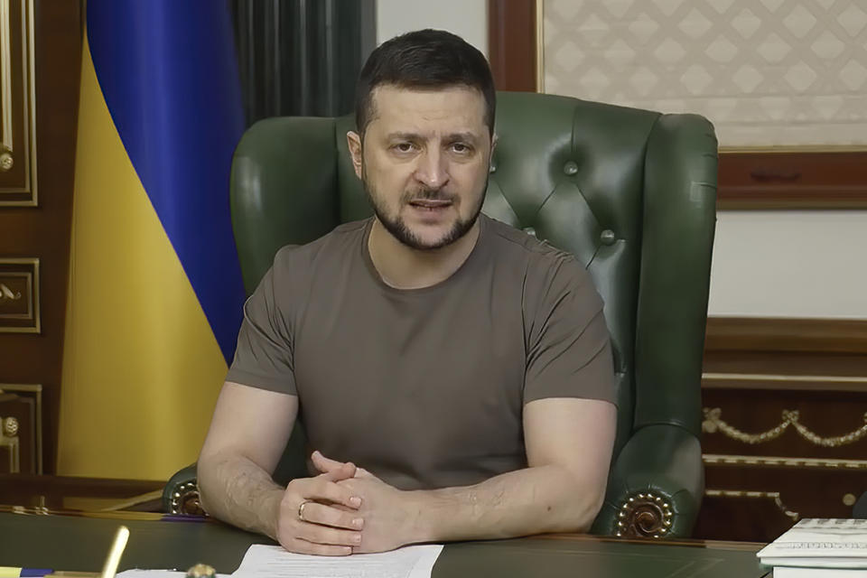 In this image from video provided by the Ukrainian Presidential Press Office, Ukrainian President Volodymyr Zelenskyy speaks from Kyiv, Ukraine, early Saturday, March 26, 2022. (Ukrainian Presidential Press Office via AP)